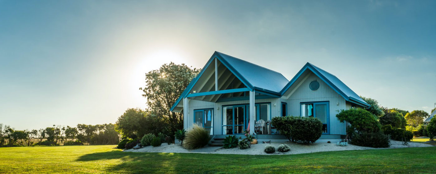 Residential house in open field